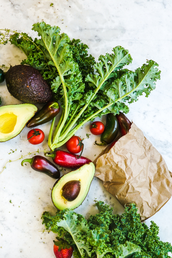 kale, avocado, radish on counter