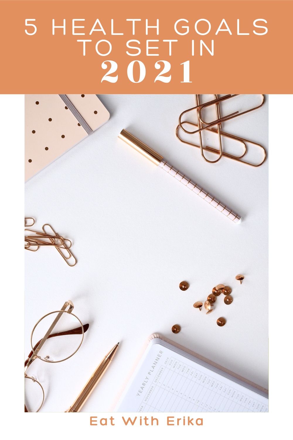 desk with glasses, notebook, pen, paperclips, 5 health goals to set in 2021